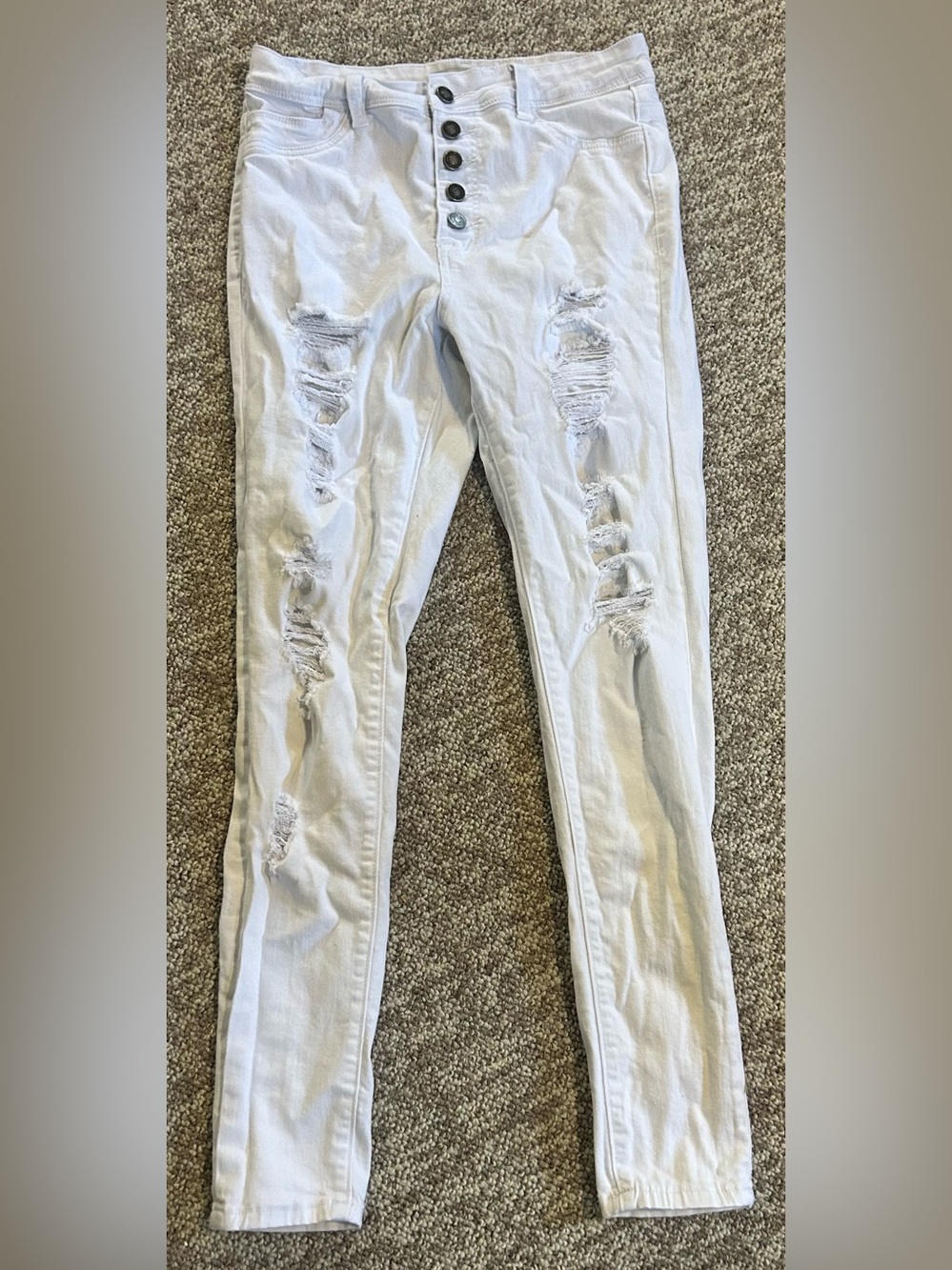 High-Rise White Distressed Skinny Jeans with Button-Fly